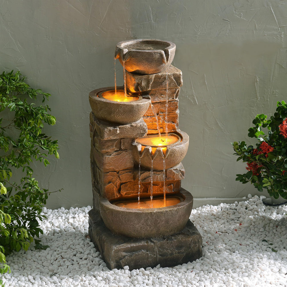 Teamson Home 33.27-inch outdoor fountain tall as a dramatic garden focal point.